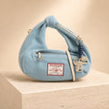 True Religion Light Blue Denim Knotted Hobo Handbag
